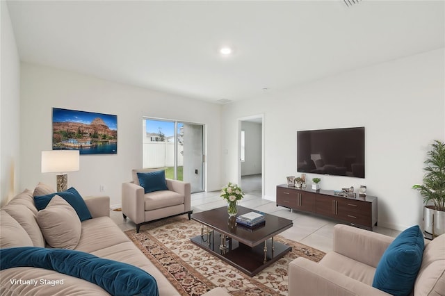 living room with light tile patterned floors