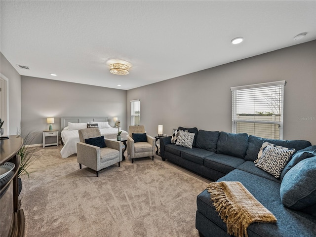 bedroom with light carpet