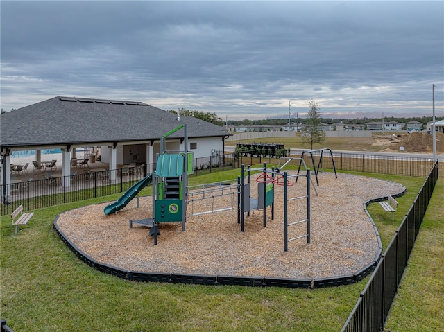 view of play area with a yard