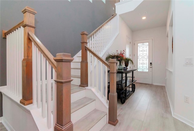 foyer with light hardwood / wood-style floors