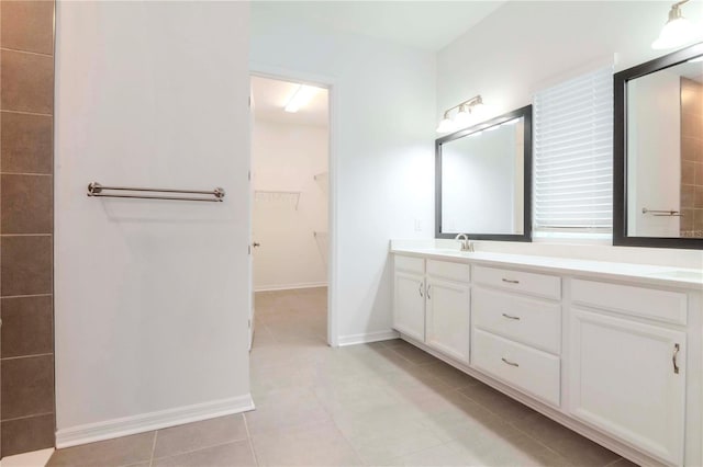 bathroom featuring vanity and tile patterned flooring