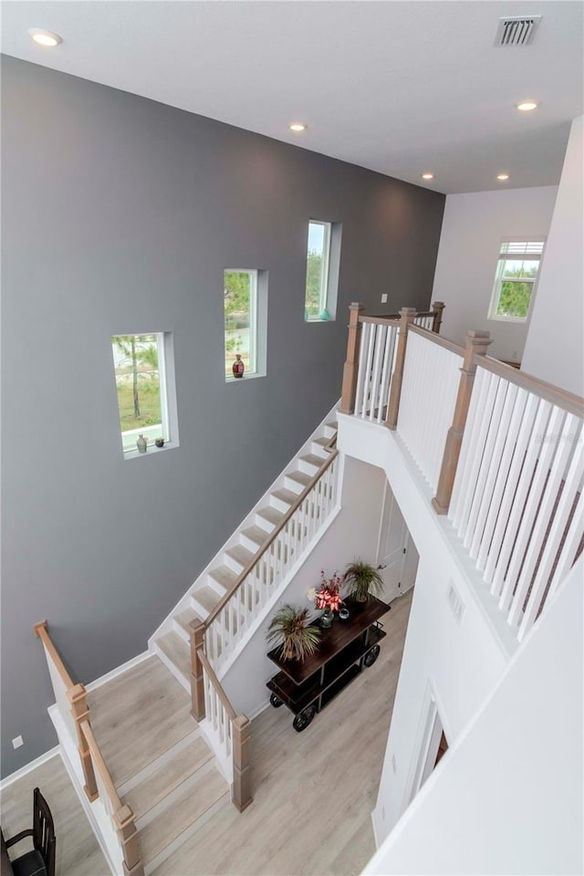 staircase featuring hardwood / wood-style flooring