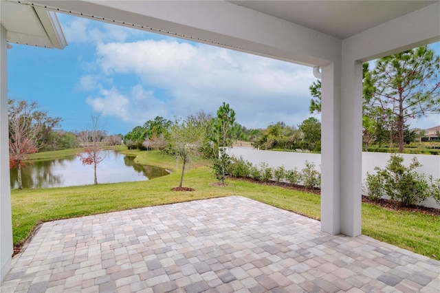 view of patio / terrace featuring a water view