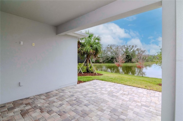 view of patio / terrace with a water view