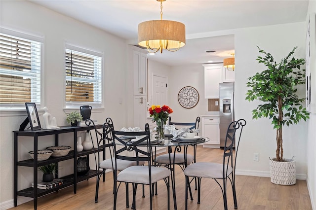 dining area featuring light hardwood / wood-style flooring