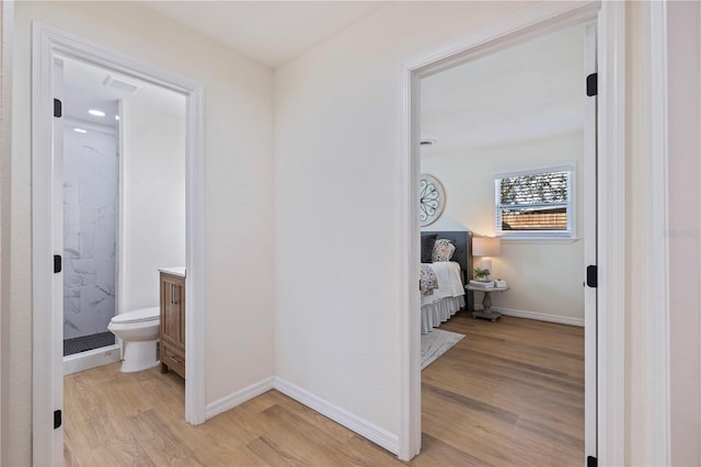 hallway featuring light wood-type flooring