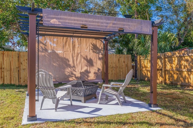 view of patio featuring a fire pit