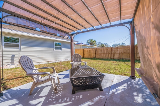 view of patio featuring an outdoor fire pit and a pergola