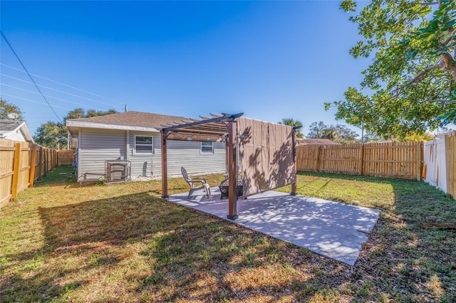 rear view of house featuring a patio, a lawn, and a pergola