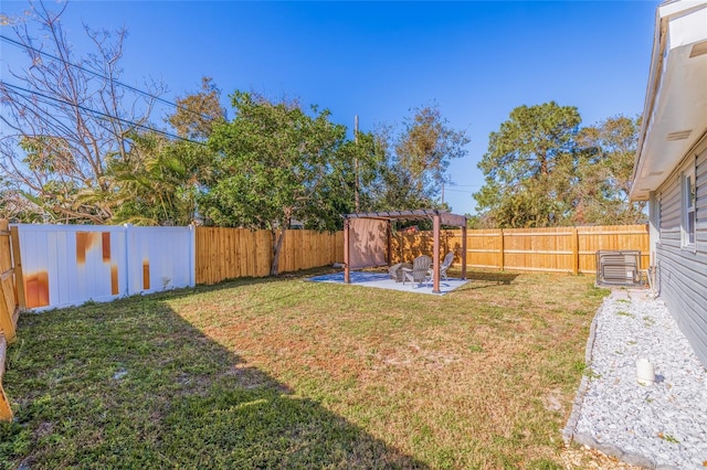 view of yard featuring cooling unit, a patio area, and a pergola