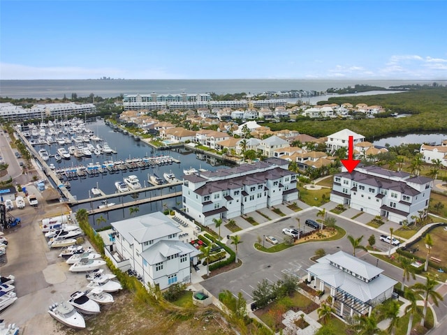 birds eye view of property featuring a water view