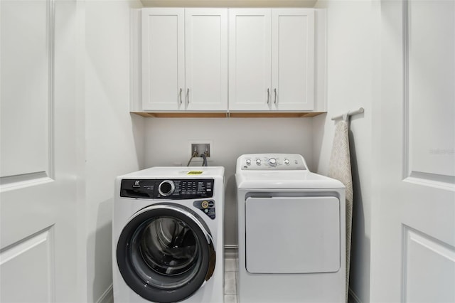 3027 Bermuda Sloop Cir, Ruskin, FL 33570 - laundry room with washing machine and dryer and cabinet space