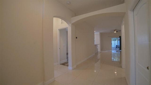 hallway with light tile patterned flooring