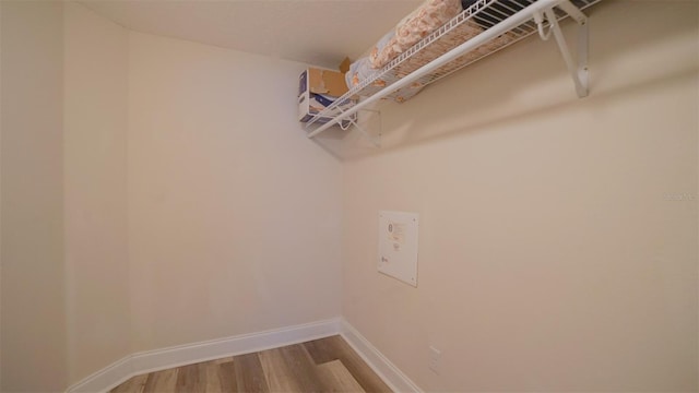 laundry room featuring hardwood / wood-style floors