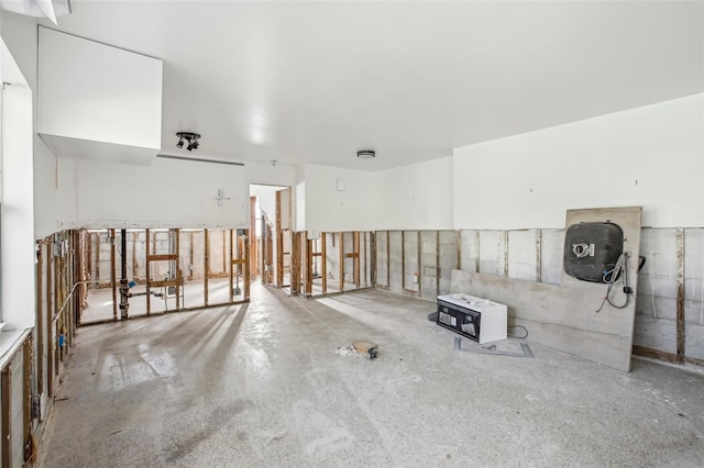 miscellaneous room with concrete flooring