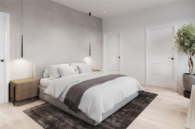 bedroom featuring light hardwood / wood-style floors