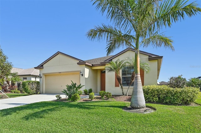 view of front of house with a garage and a front yard