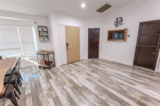 entrance foyer featuring light wood-type flooring