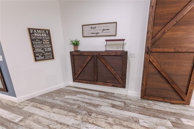 interior details featuring hardwood / wood-style flooring