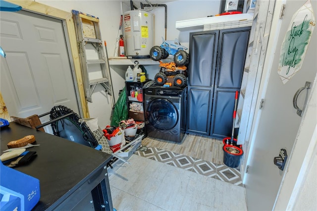 laundry area with washer / clothes dryer and water heater