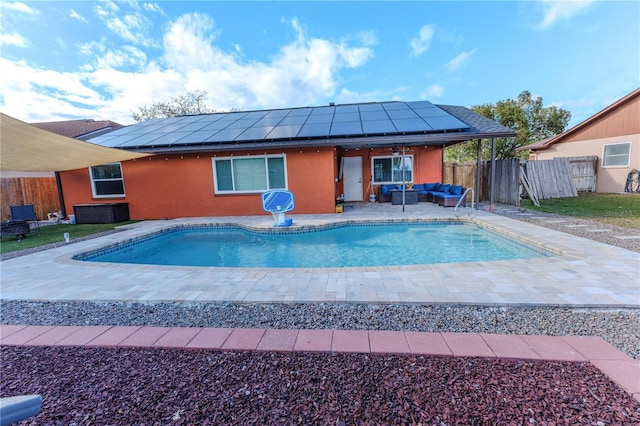 view of pool with an outdoor living space and a patio