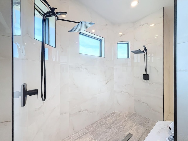 bathroom featuring tiled shower