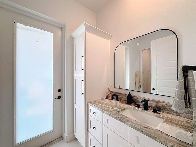 bathroom featuring vanity and tile patterned floors