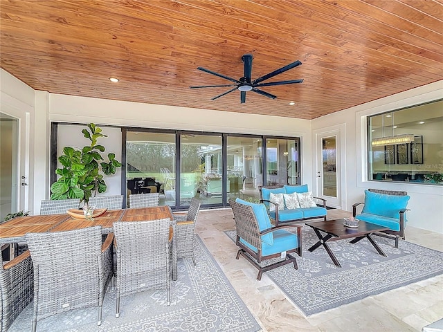 view of patio with ceiling fan and an outdoor living space