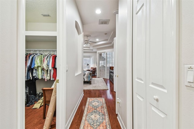 hallway featuring dark hardwood / wood-style floors