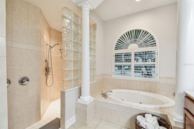 bathroom with vanity, tile patterned floors, plus walk in shower, and decorative columns