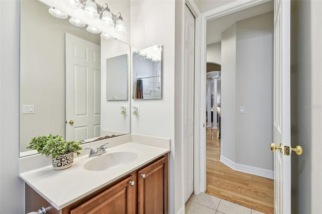 bathroom with vanity and tile patterned flooring