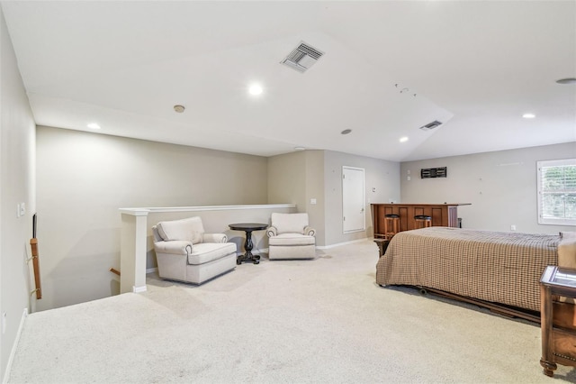 bedroom with light carpet and lofted ceiling