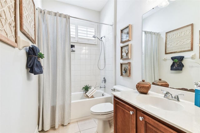 full bathroom with vanity, tile patterned floors, toilet, and shower / bath combo