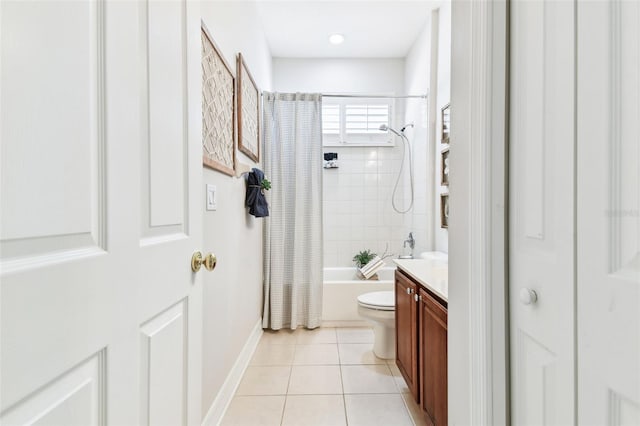 full bathroom with tile patterned flooring, baseboards, toilet, shower / bath combination with curtain, and vanity