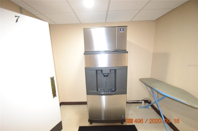 kitchen featuring a drop ceiling