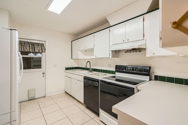 kitchen with dishwasher, white cabinetry, sink, white refrigerator, and range with electric stovetop