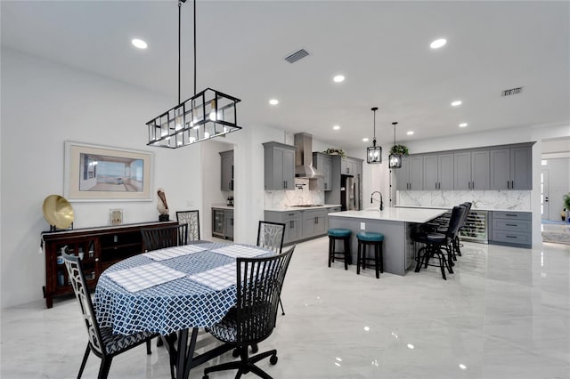 dining space featuring beverage cooler