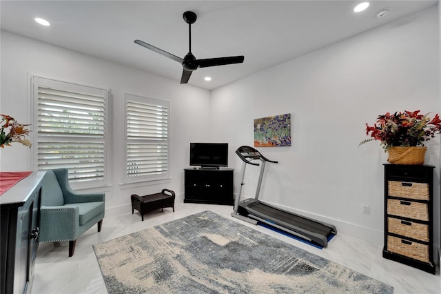 exercise room featuring ceiling fan