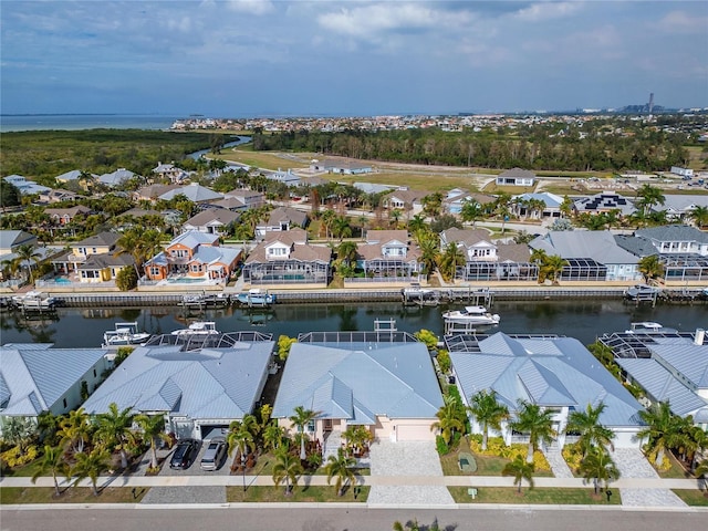 drone / aerial view with a water view