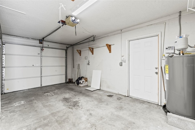 garage featuring a garage door opener and water heater