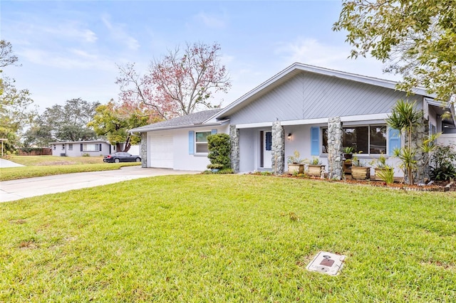 single story home with a garage, a front lawn, and covered porch