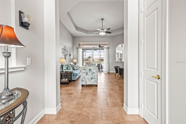 interior space with a tray ceiling