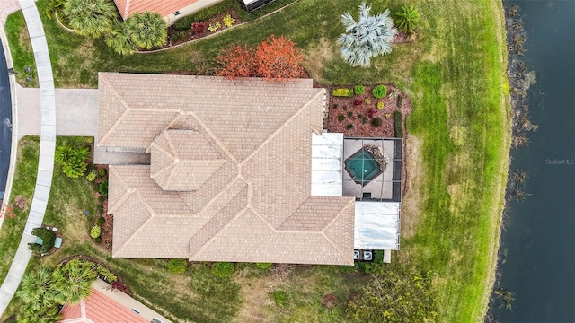 bird's eye view with a water view