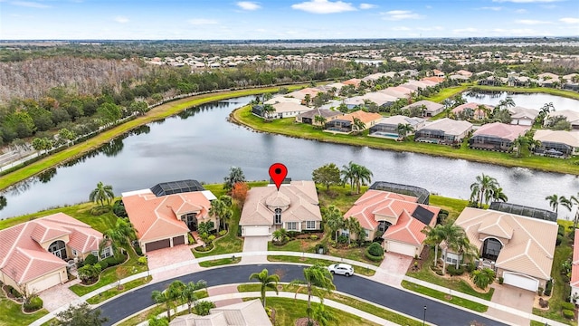 drone / aerial view featuring a water view