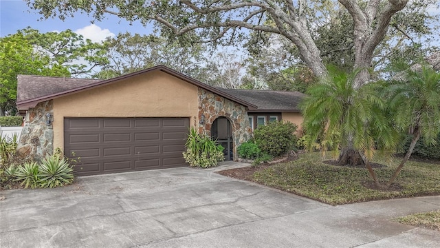 single story home with a garage