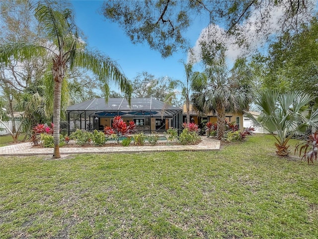 view of yard with a lanai