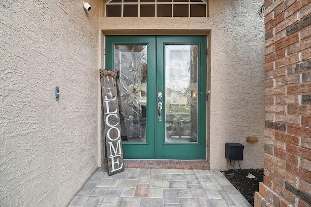 view of exterior entry with french doors