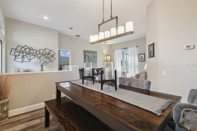 dining area featuring hardwood / wood-style floors