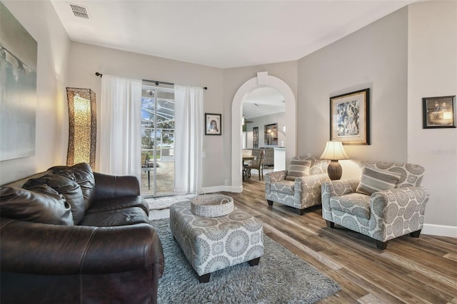 living room with hardwood / wood-style flooring