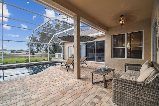 view of patio with a lanai